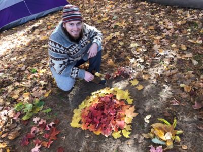 Adam with fallen leaves